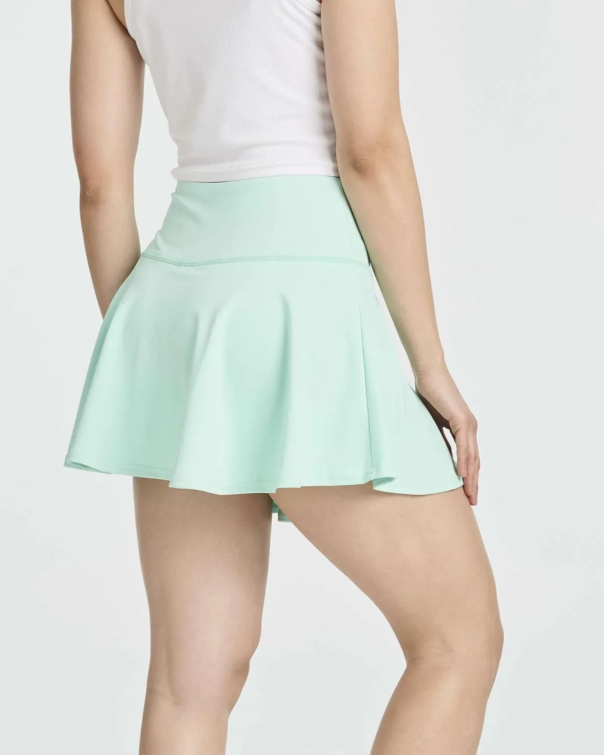 Real Essentials 4 Pack: Women's High Waisted Tennis Skirts Skater Skort Tummy Control Golf Shorts Pockets (Available in Plus)